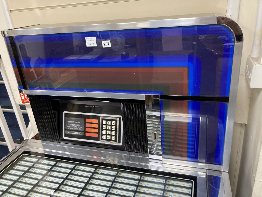 A 1970s Seeburg juke box, width 100cm depth 69cm height 136cm
